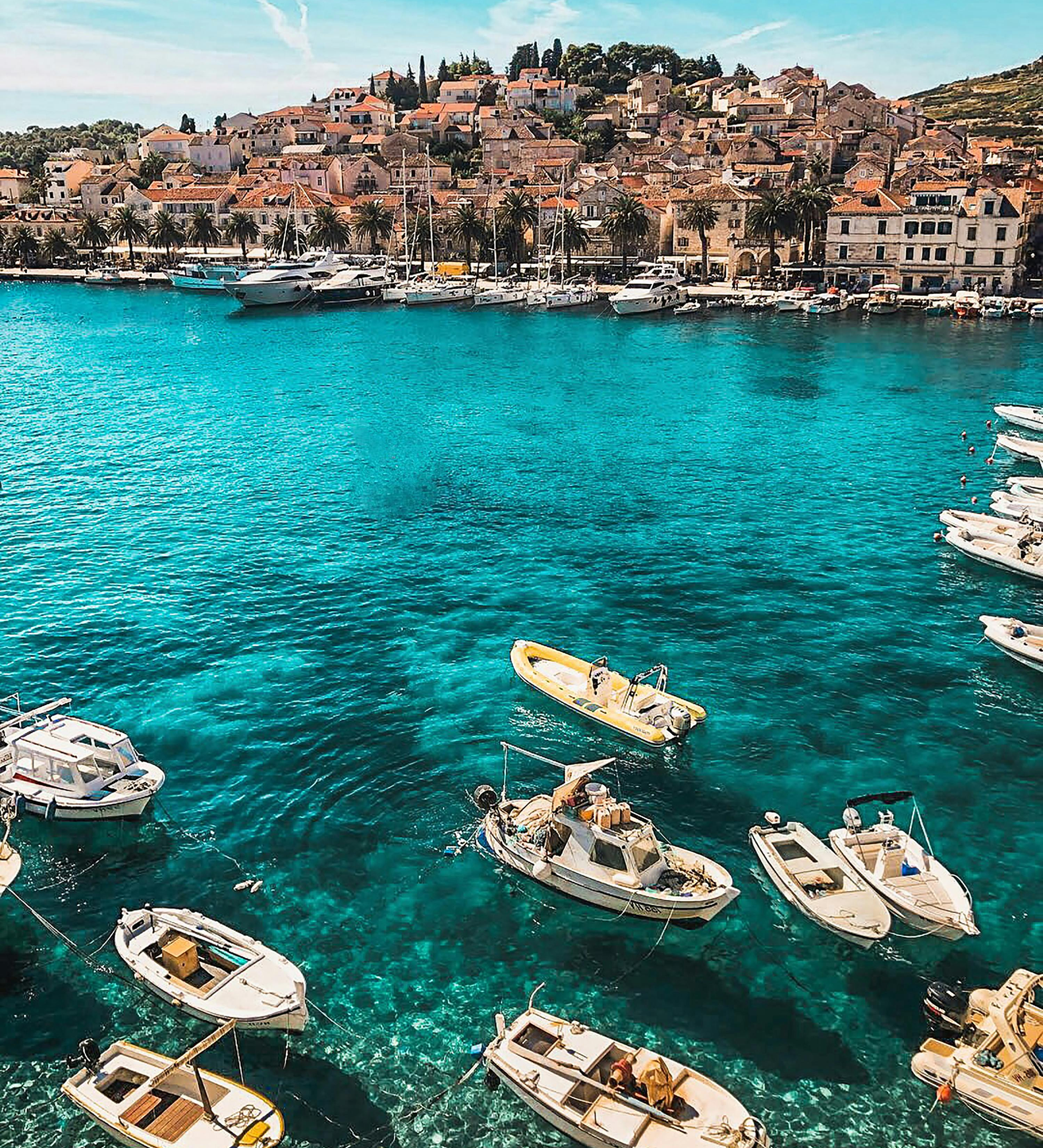 Travel advisors planning a luxury itinerary at Exquisite Travel Group